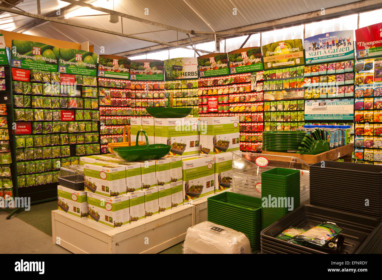 Interior Of A garden Centre Featuring Display Racks Of Flower and