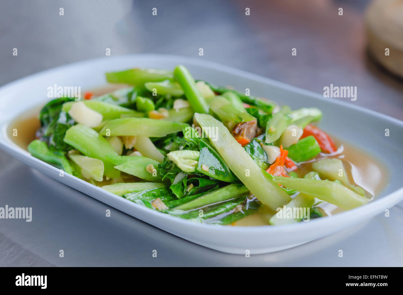 Stir fried kaled with sun dried salted fish Stock Photo