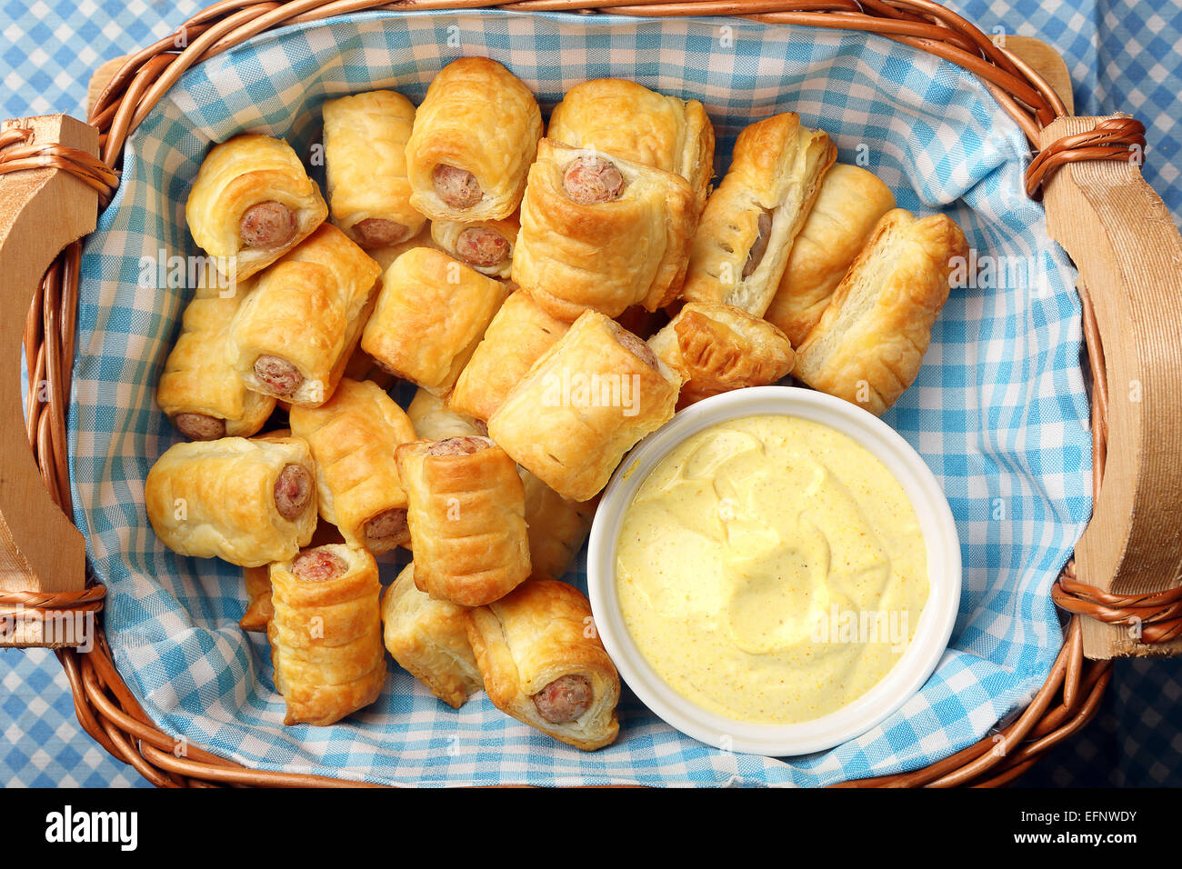 White sausage in puff pastry with joppie sauce Stock Photo Alamy