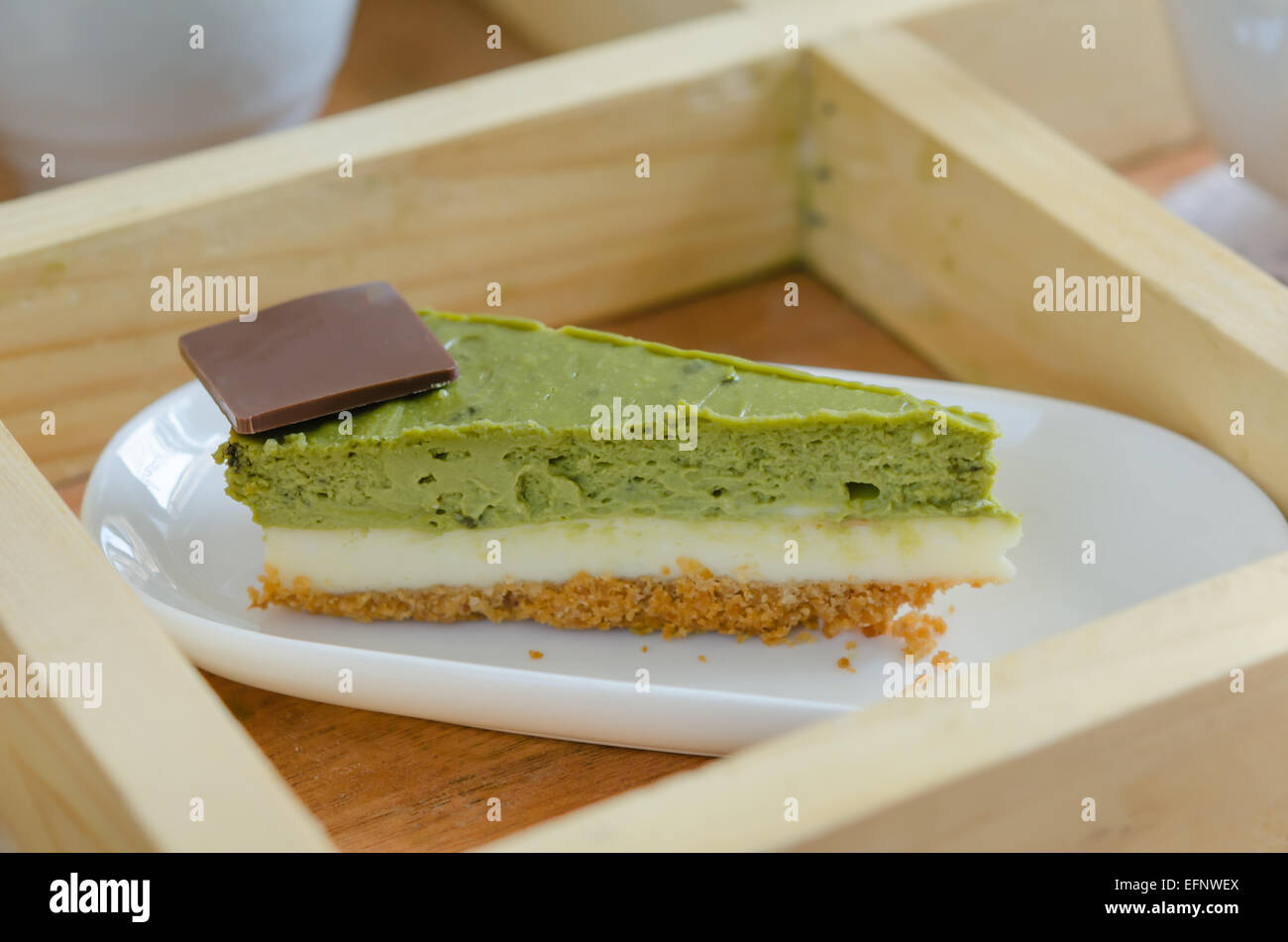 green tea ( Matcha ) cheese cake with chocolate Stock Photo