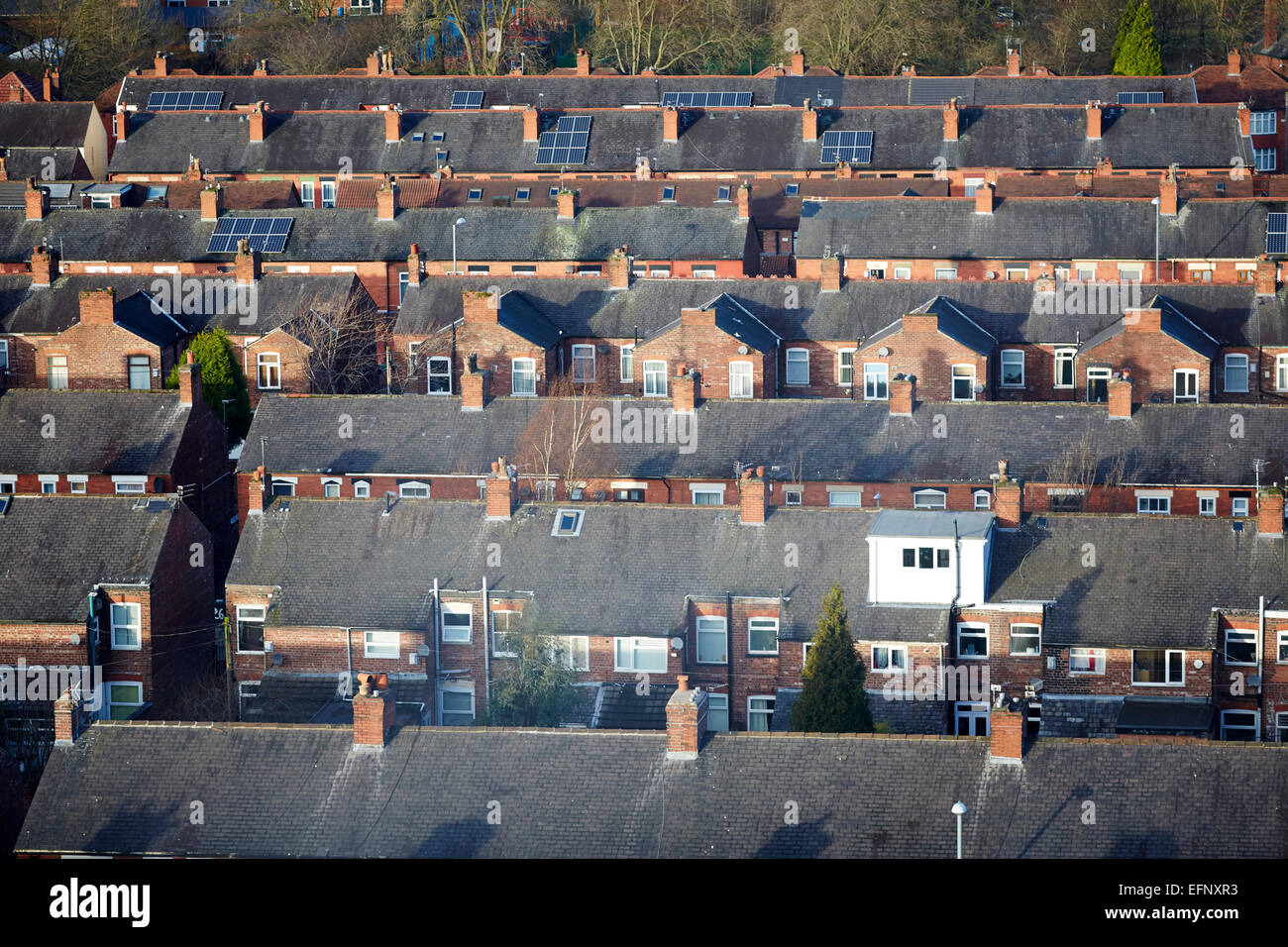 Terrace back to back housing rooftops in Levenshulme Manchester UK