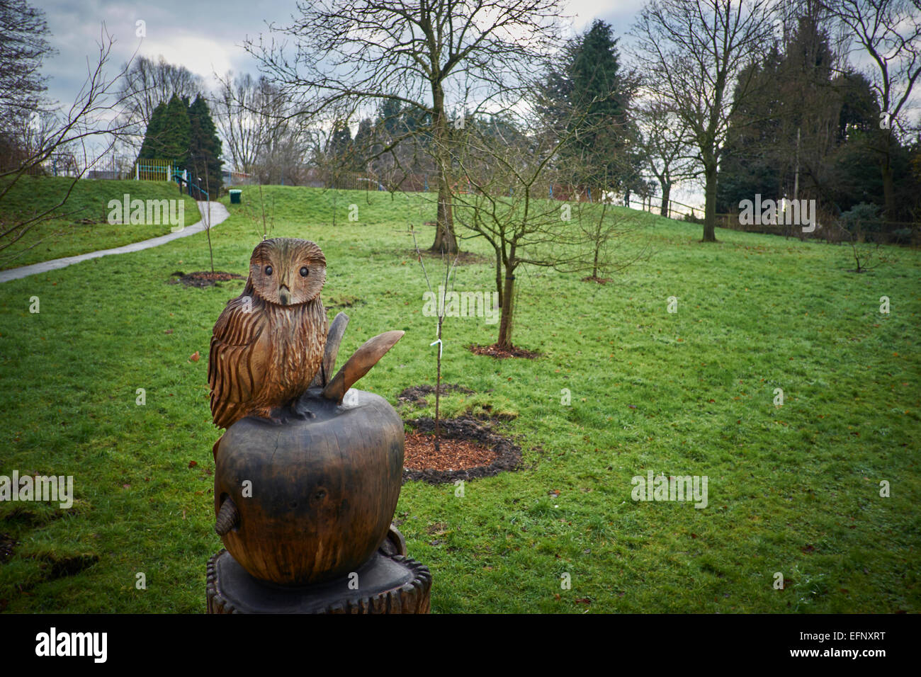 Debdale Park Gorton Manchester UK tree carving in the community orchard Stock Photo