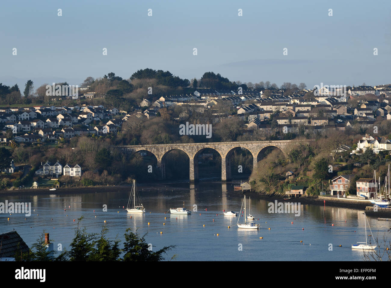 Rail bridge over a small creek at Saltash, Cornwall, UK.  Viewed across the River Tamar from St Budeaux, Plymouth. Stock Photo