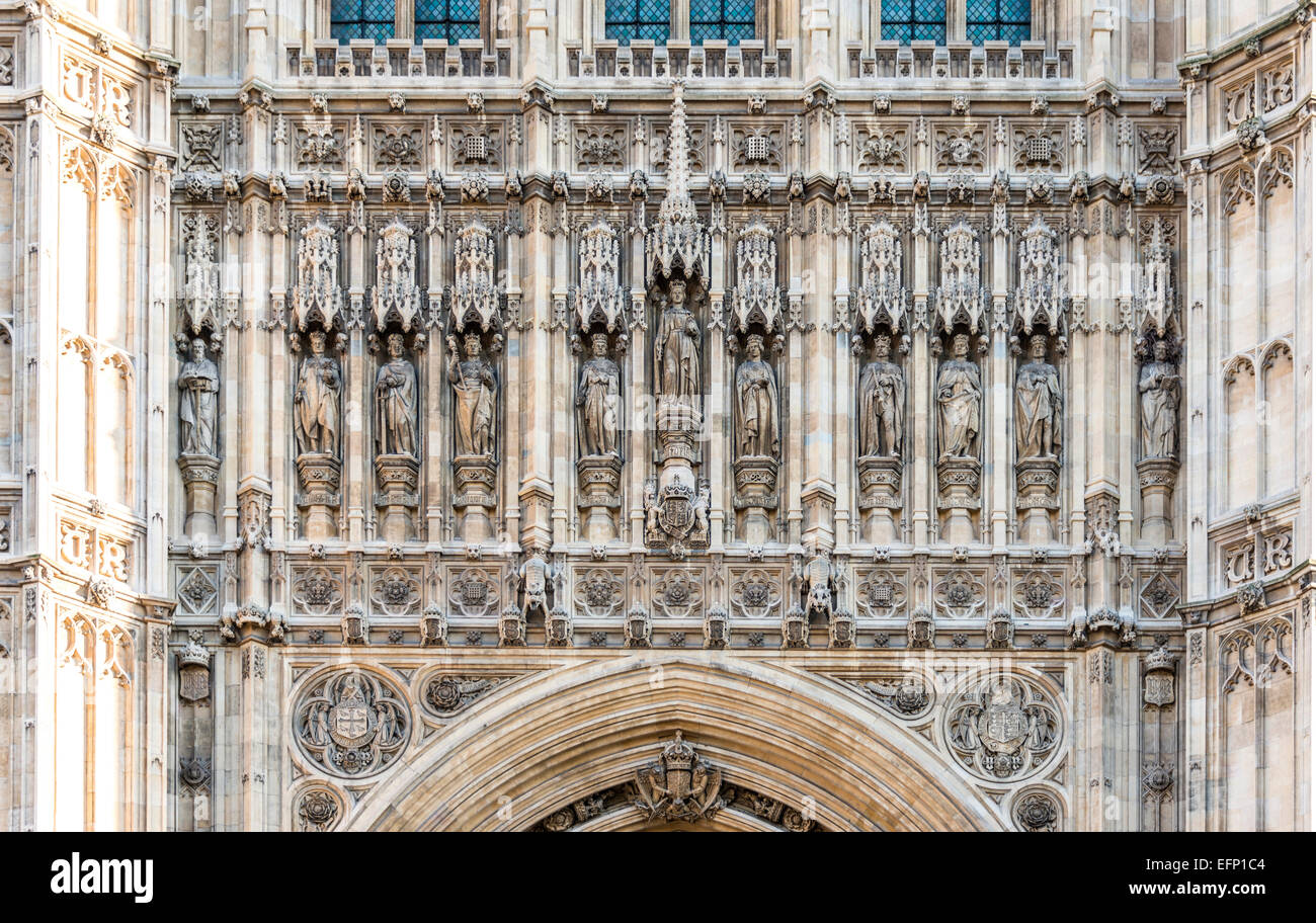 Statues above the Sovereign's Entrance of the Victoria Tower of the Houses of Parliament, London, UK Stock Photo