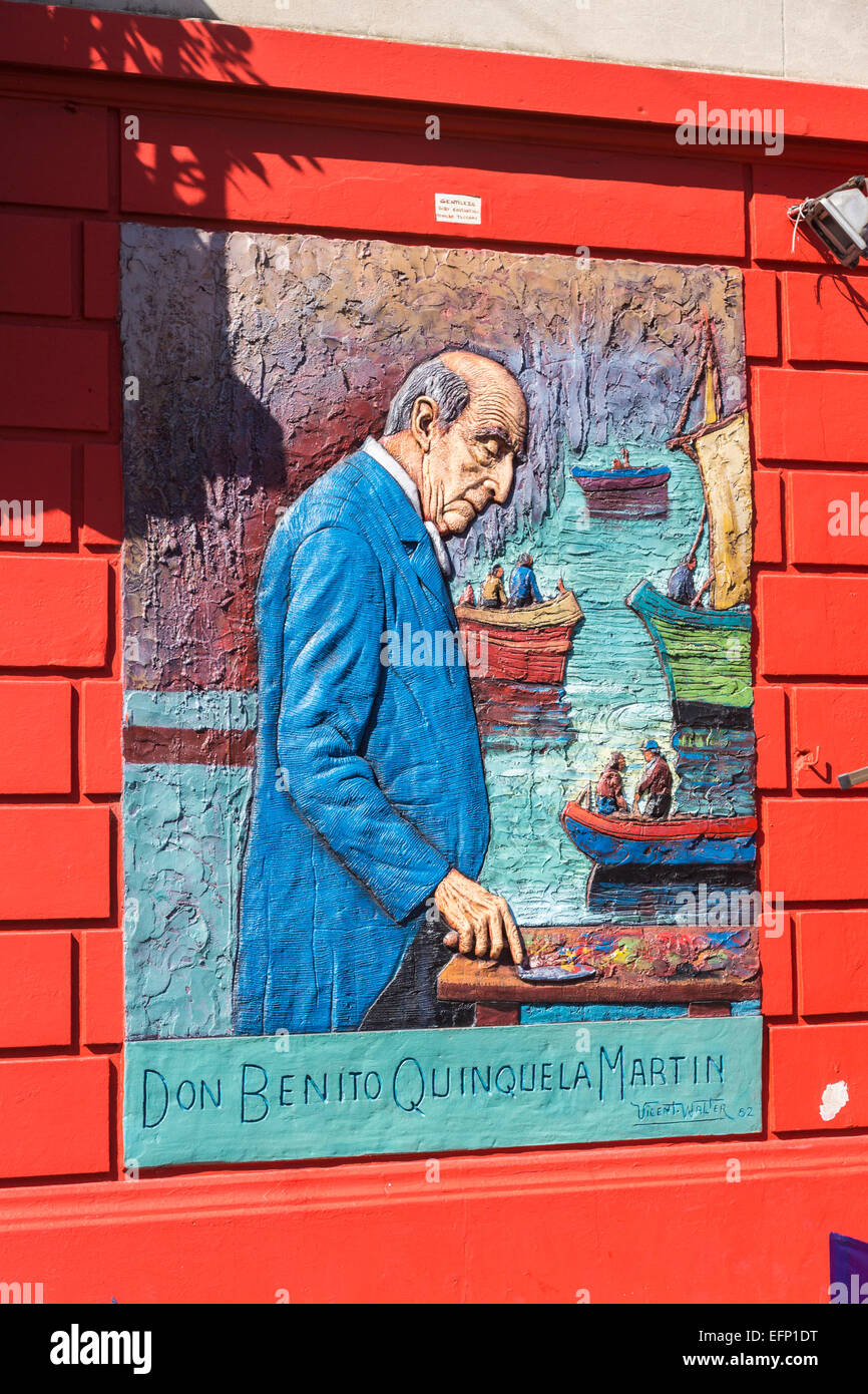 Colourful mural sign outside a roadside restaurant depicting artist Don Benito Quinquela Martin painting, La Boca, Buenos Aires, Argentina Stock Photo