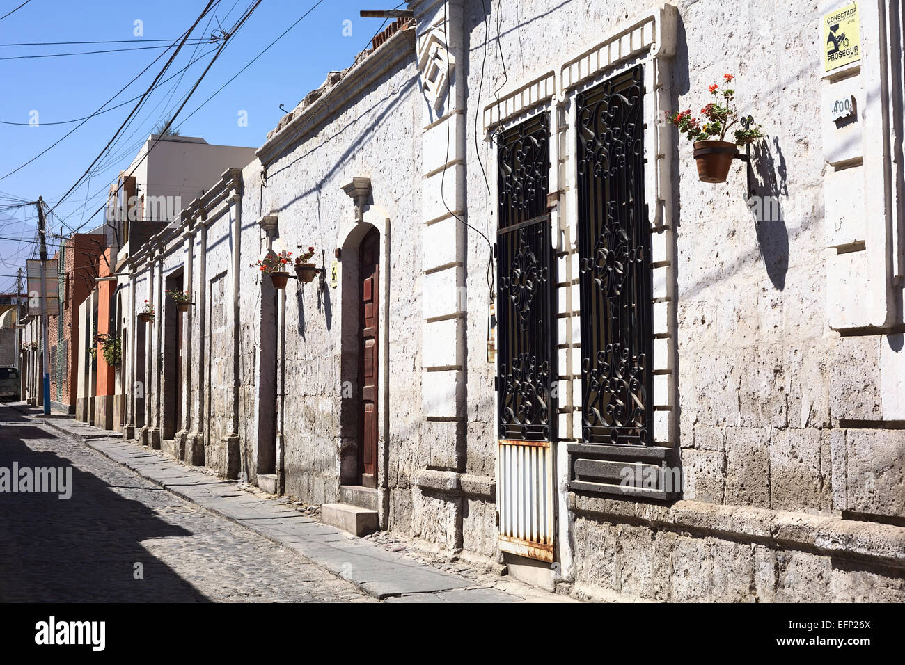 Typical houses built with sillar, the volcanic rock, on Tacna street in the district of Yanahuara in Arequipa, Peru Stock Photo