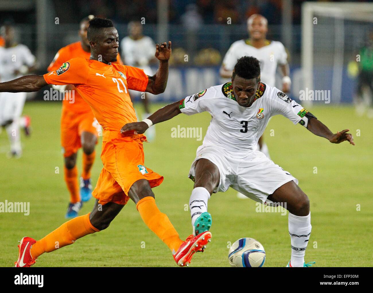 Bata, Equatorial Guinea. 8th Feb, 2015. Asamoah Gyan (R) of Ghana vies with  Eric Bertrand Bailly of Cote d'Ivoire during the final match of Africa Cup  of Nations in Bata, Equatorial Guinea,