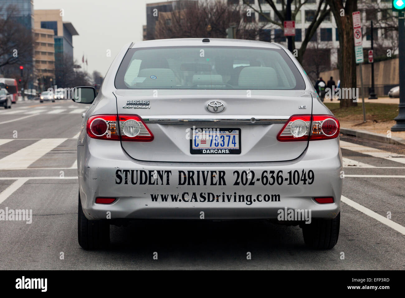Student driver (learner driver) sign on top of driver training car - USA Stock Photo