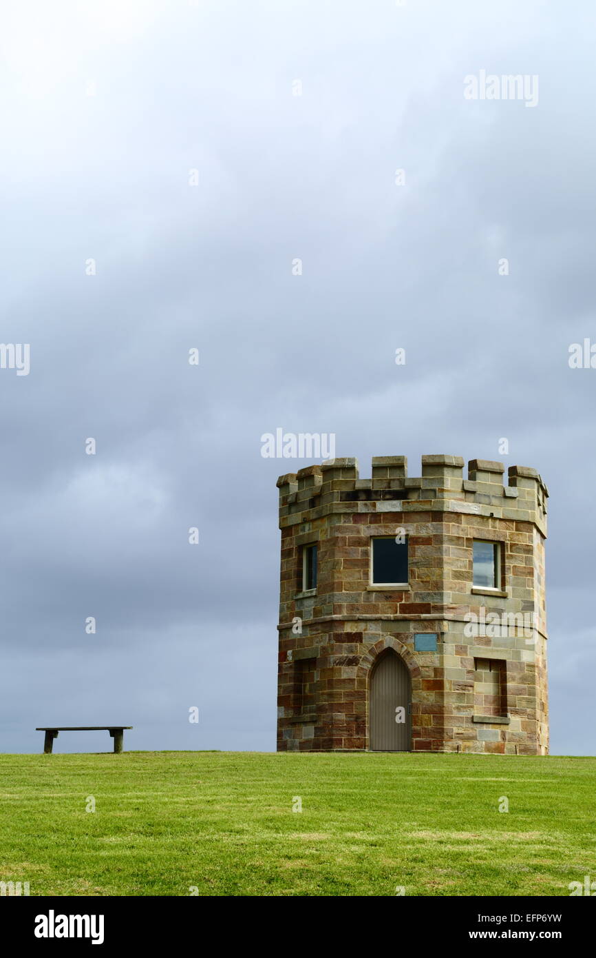 Heavy clouds hang over the historic Customs Tower at La Perouse, on the banks of Botany Bay near Sydney, NSW, Australia. Stock Photo