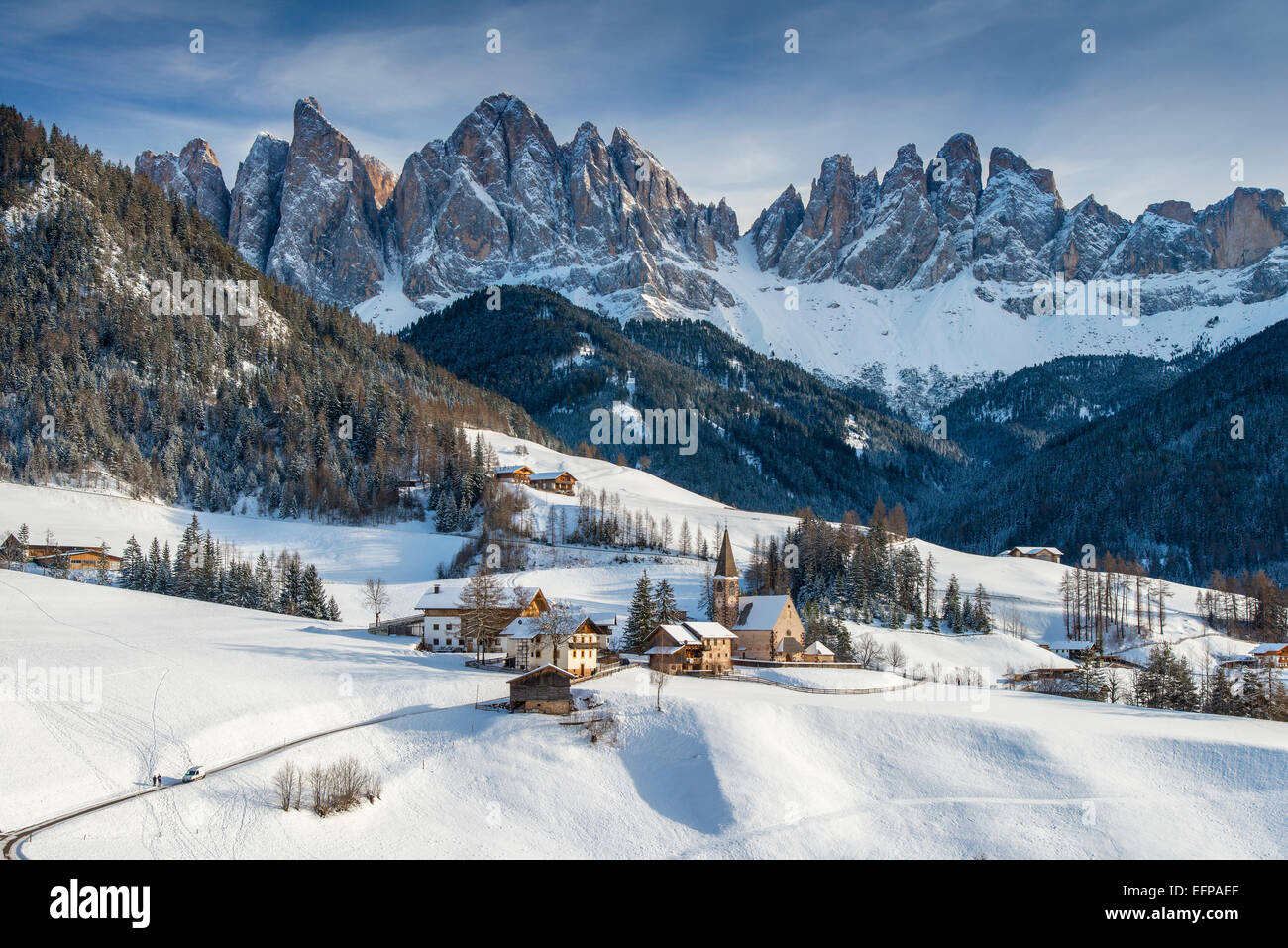 Scenic winter view of Vilnoss or Val di Funes with Puez-Geisler ...