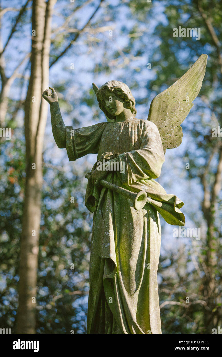Statue of an angel with a trumpet, Highgate Cemetery west, London, England, United Kingdom, Europe Stock Photo