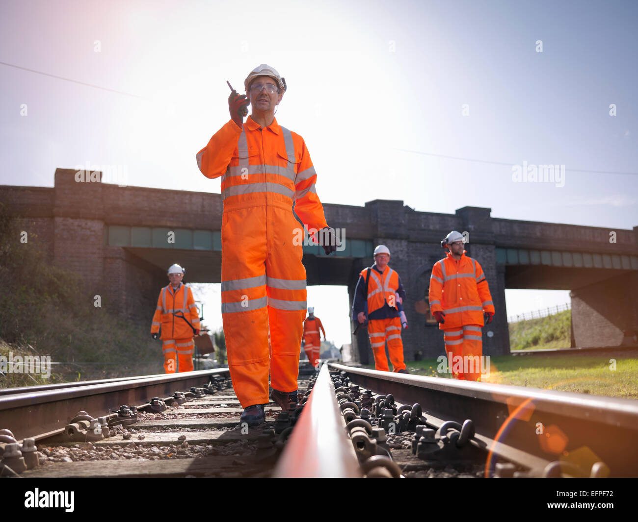 Railway workers on railway track Stock Photo
