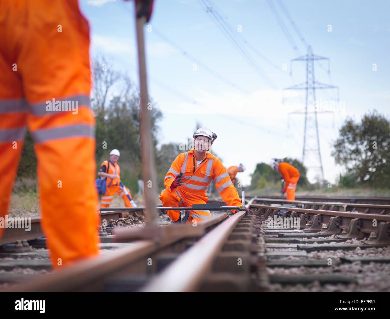 Railway maintenance workers inspecting track Stock Photo
