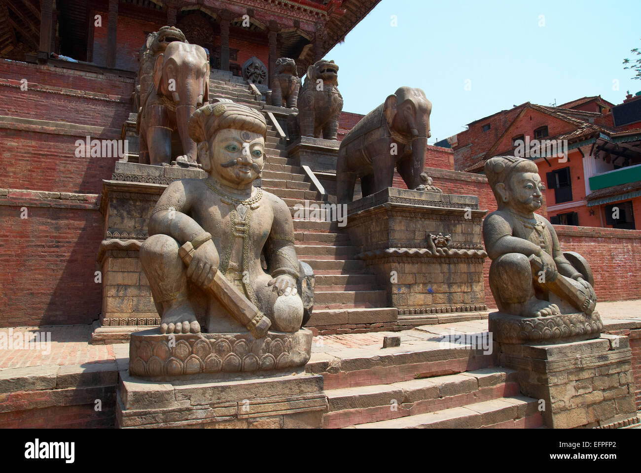 Old buddhistic statues on Bhaktapur Square. Kathmandu, Nepal Stock