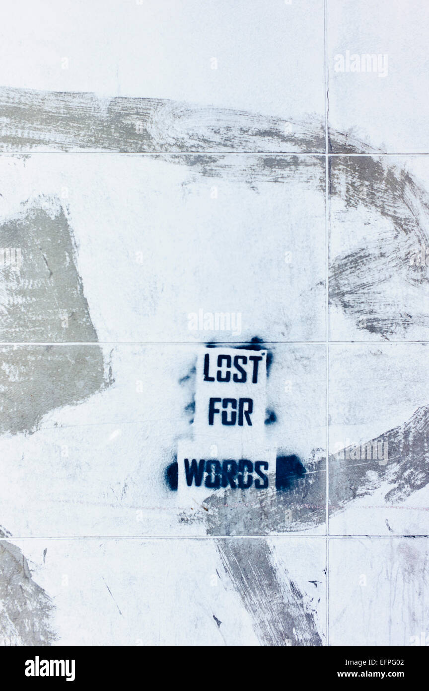 Words on wall, lost for words Stock Photo