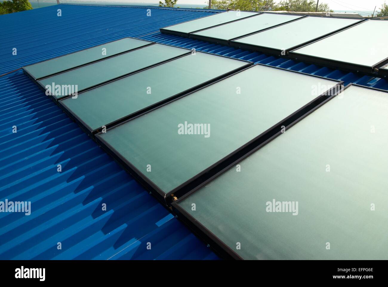 Solar water heating system on the house roof Stock Photo - Alamy