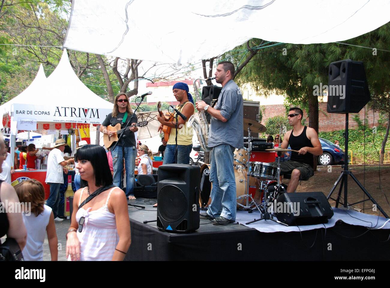 Pop group playing in the park during the Romeria San Bernabe festival, Marbella, Costa del Sol