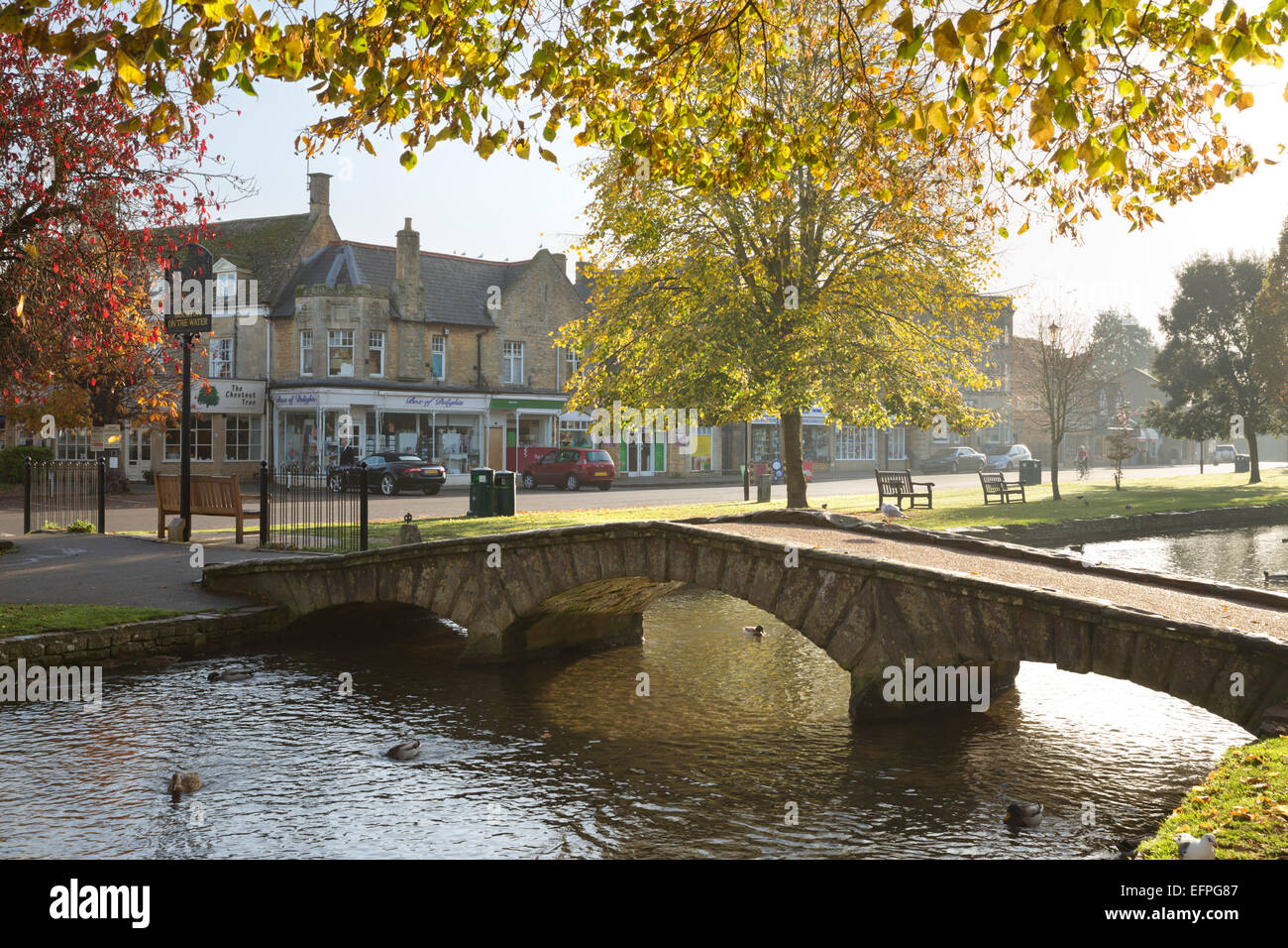 High Street and bridge over River Windrush, Bourton-on-the-Water, Cotswolds, Gloucestershire, England, United Kingdom, Europe Stock Photo