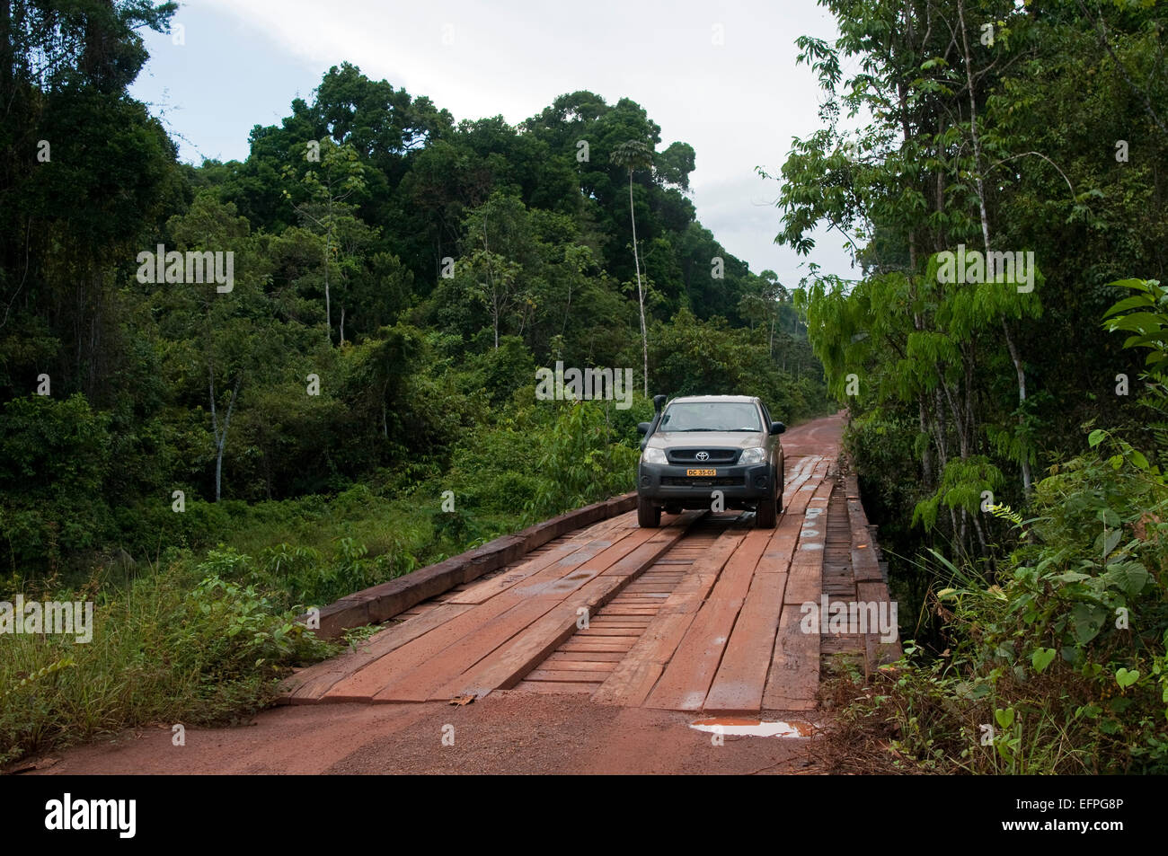 Crossing a bridge on the main highway through Guyana's rainforest, Guyana, South America Stock Photo