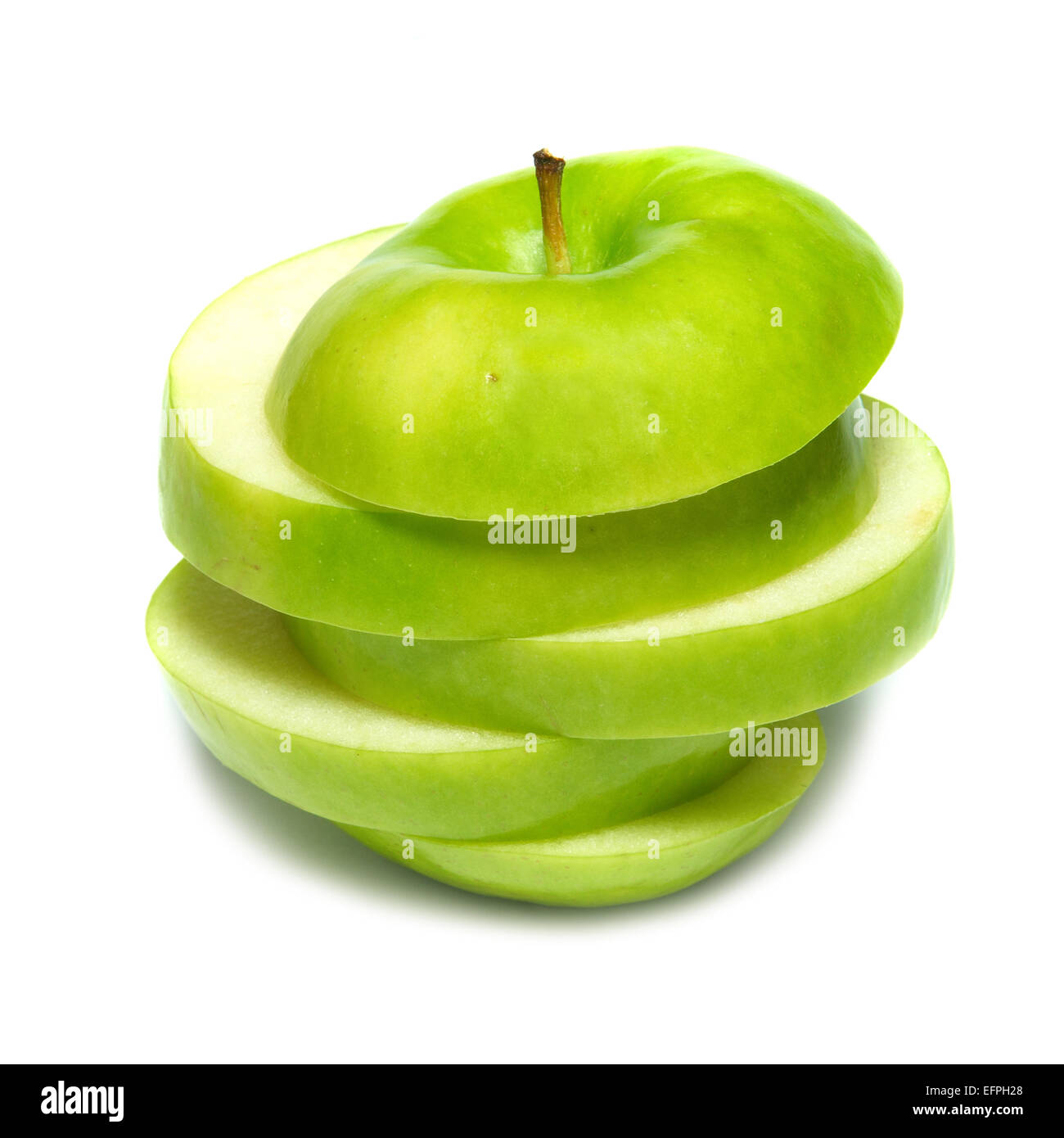 Sliced green apple isolated on white background Stock Photo - Alamy