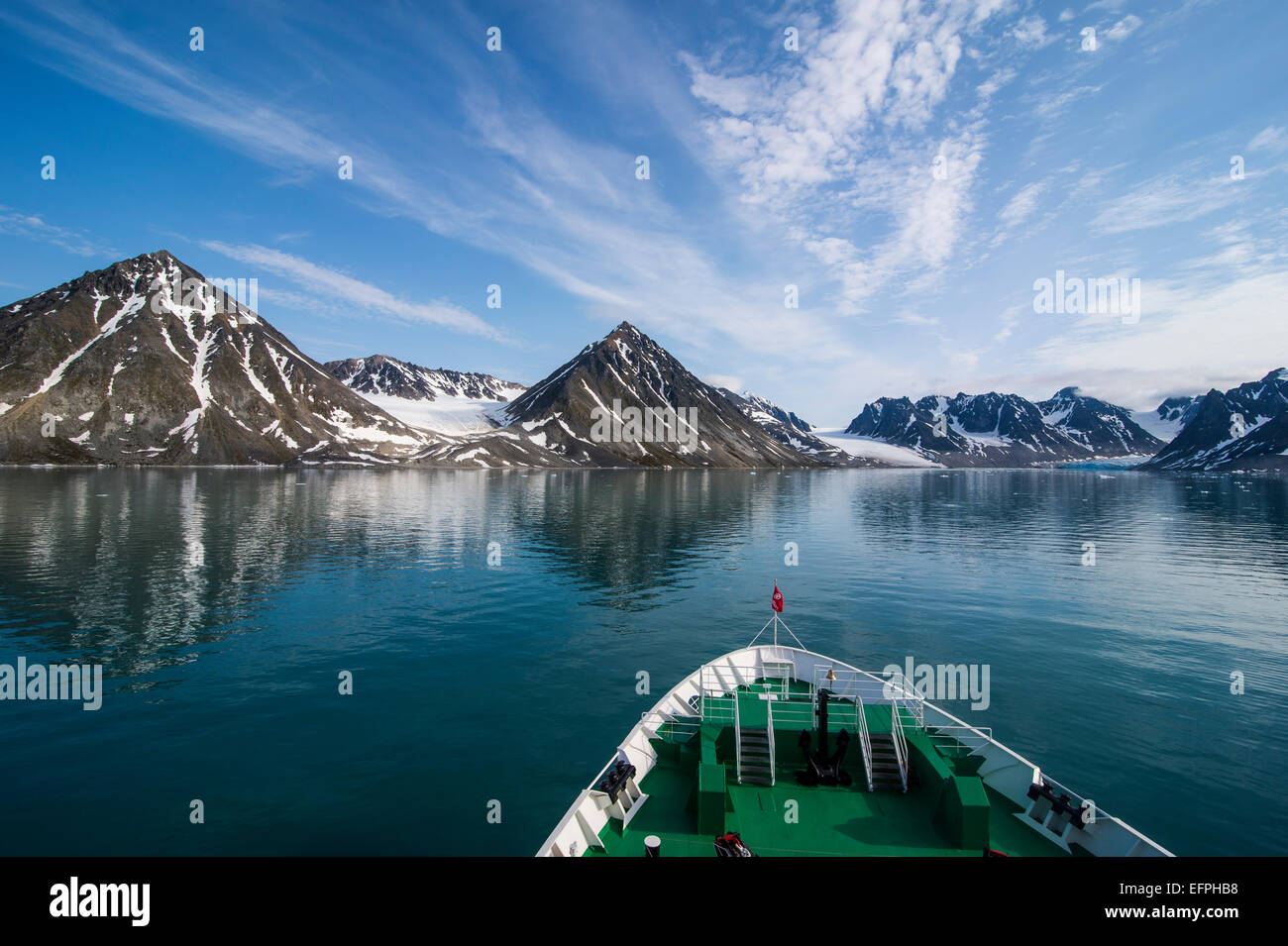 Expedition boat entering the Magdalenen Fjord, Svalbard, Arctic, Norway, Scandinavia, Europe Stock Photo
