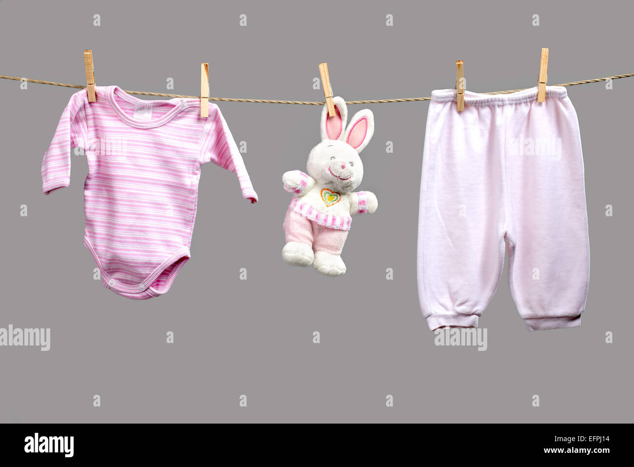 Baby girl y clothes on the clothesline Stock Photo Alamy
