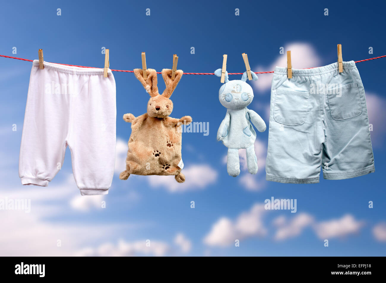 Baby is born    Boy or a girl on the outdoor clothesline Stock Photo