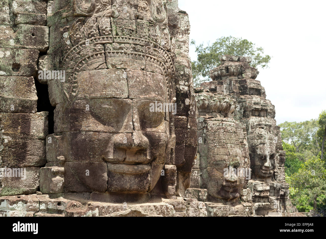 Huge faces carved in stone, Bayon Temple, UNESCO World Heritage Site, Angkor, Siem Reap, Cambodia, Indochina, Southeast Asia Stock Photo