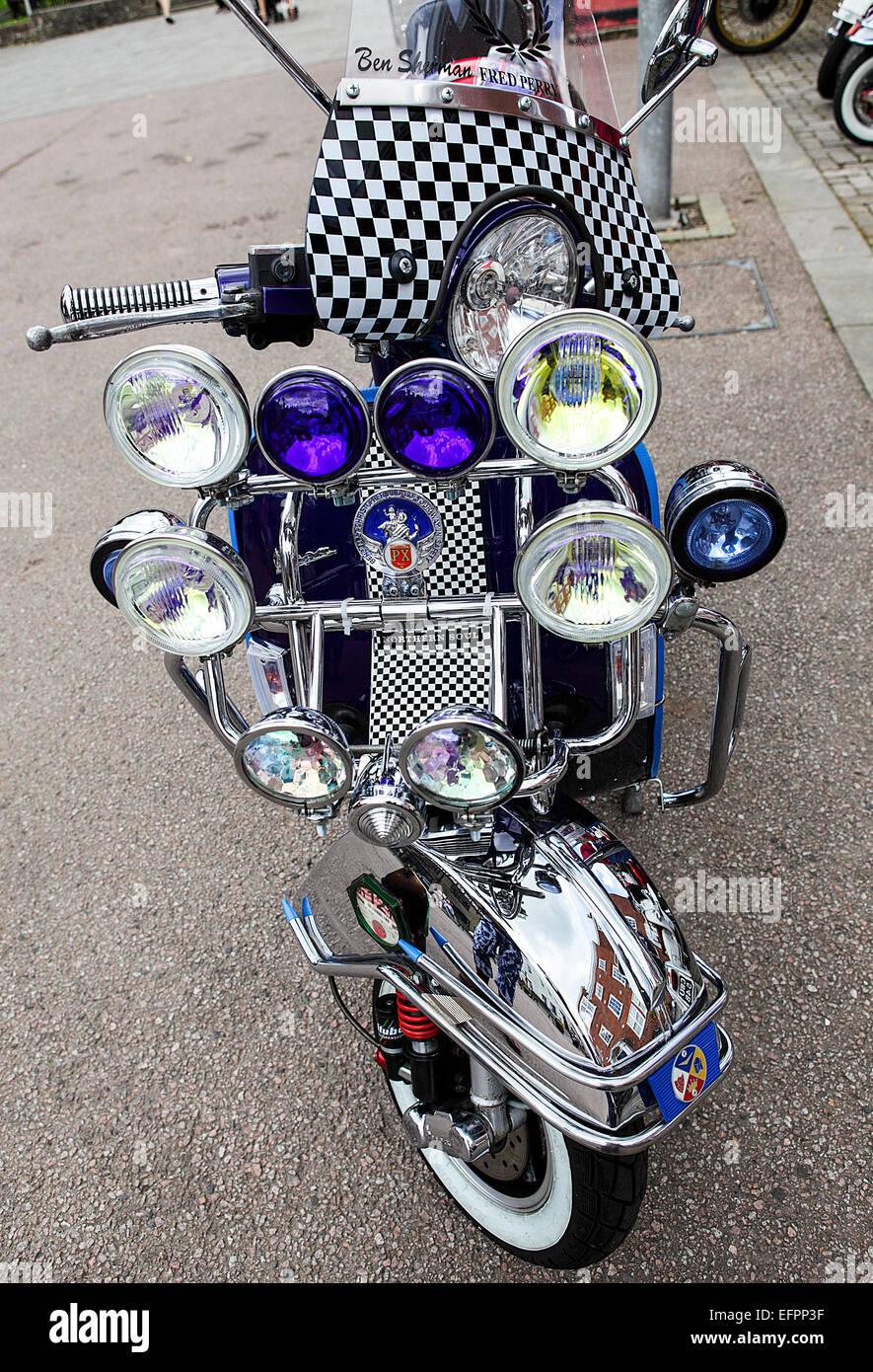 Customized scooters, seen here in close-up during a rally in the market square at Ludlow during the summer of 2014. Stock Photo