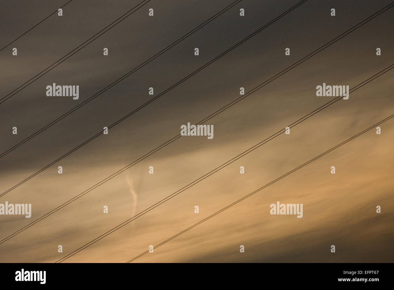 Power lines seen against a cloudy sky, Abingdon, UK Stock Photo - Alamy