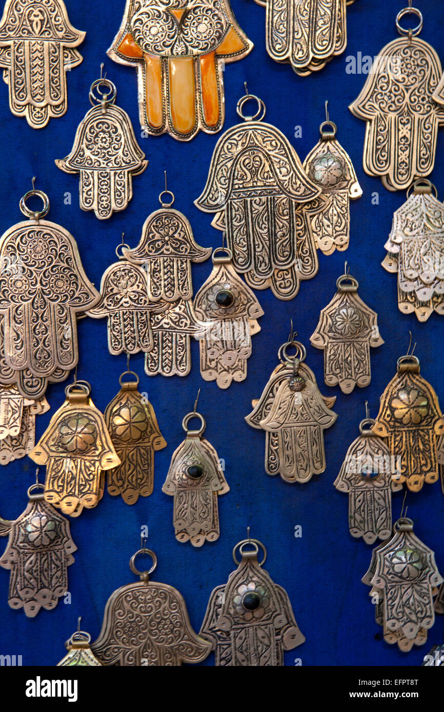 Hand of Fatima amulets on market stall, Marakech, Morocco Stock Photo