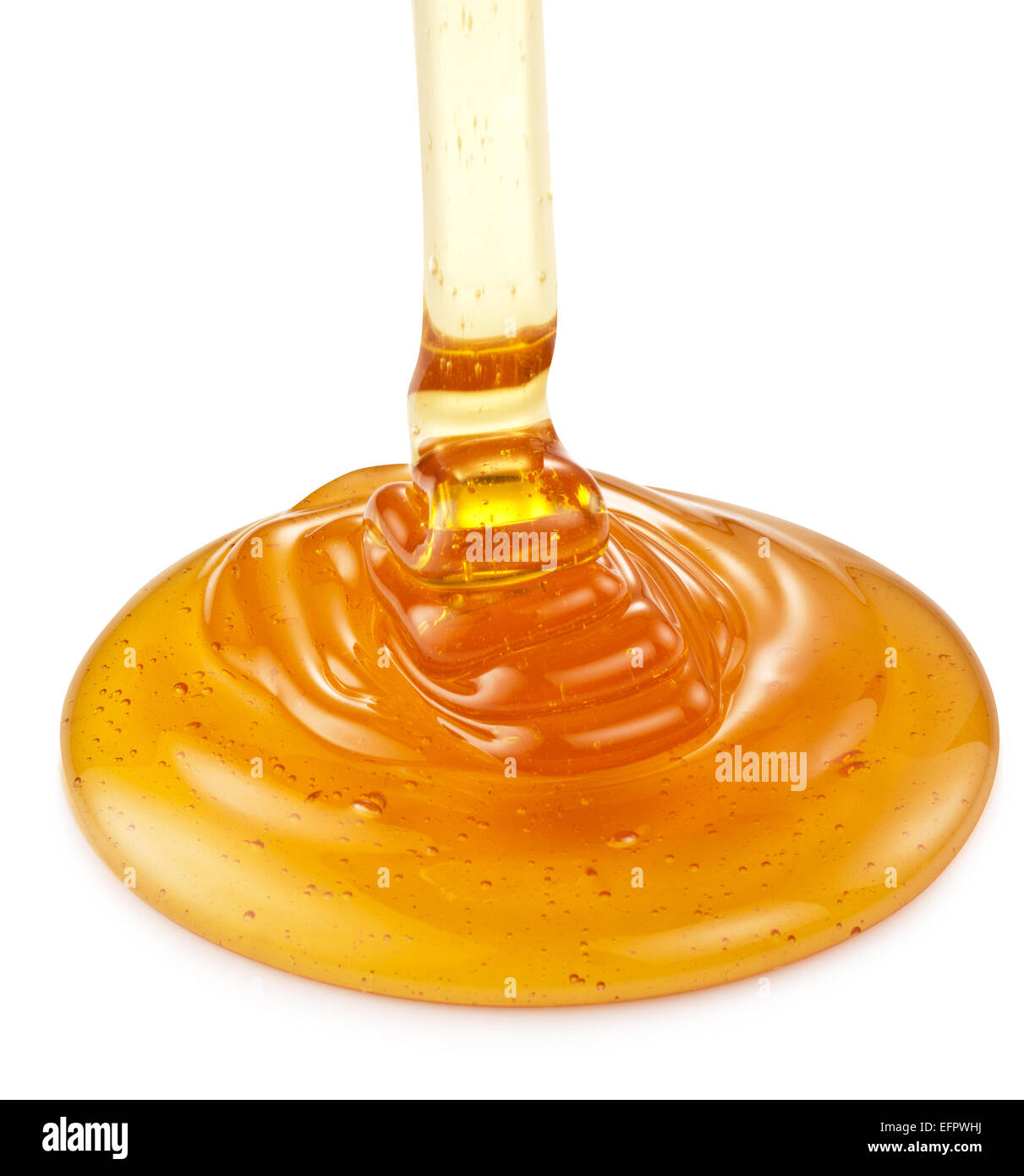 Honey flowing on the white background. Clipping paths. Stock Photo