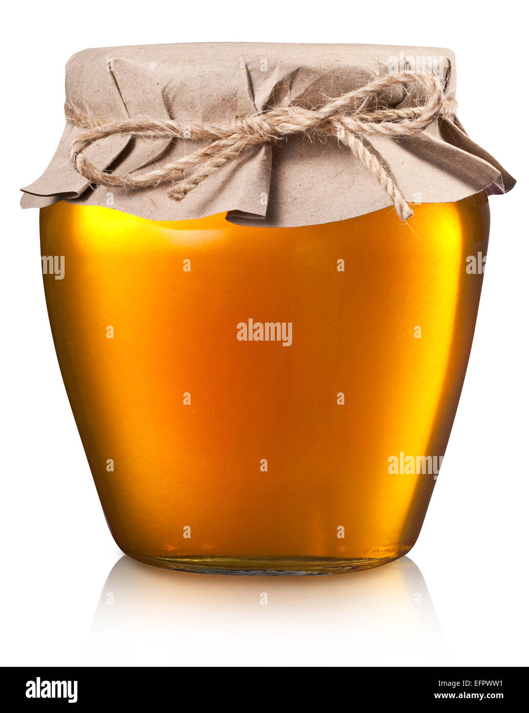 Glass can full of honey. Clipping paths. Stock Photo