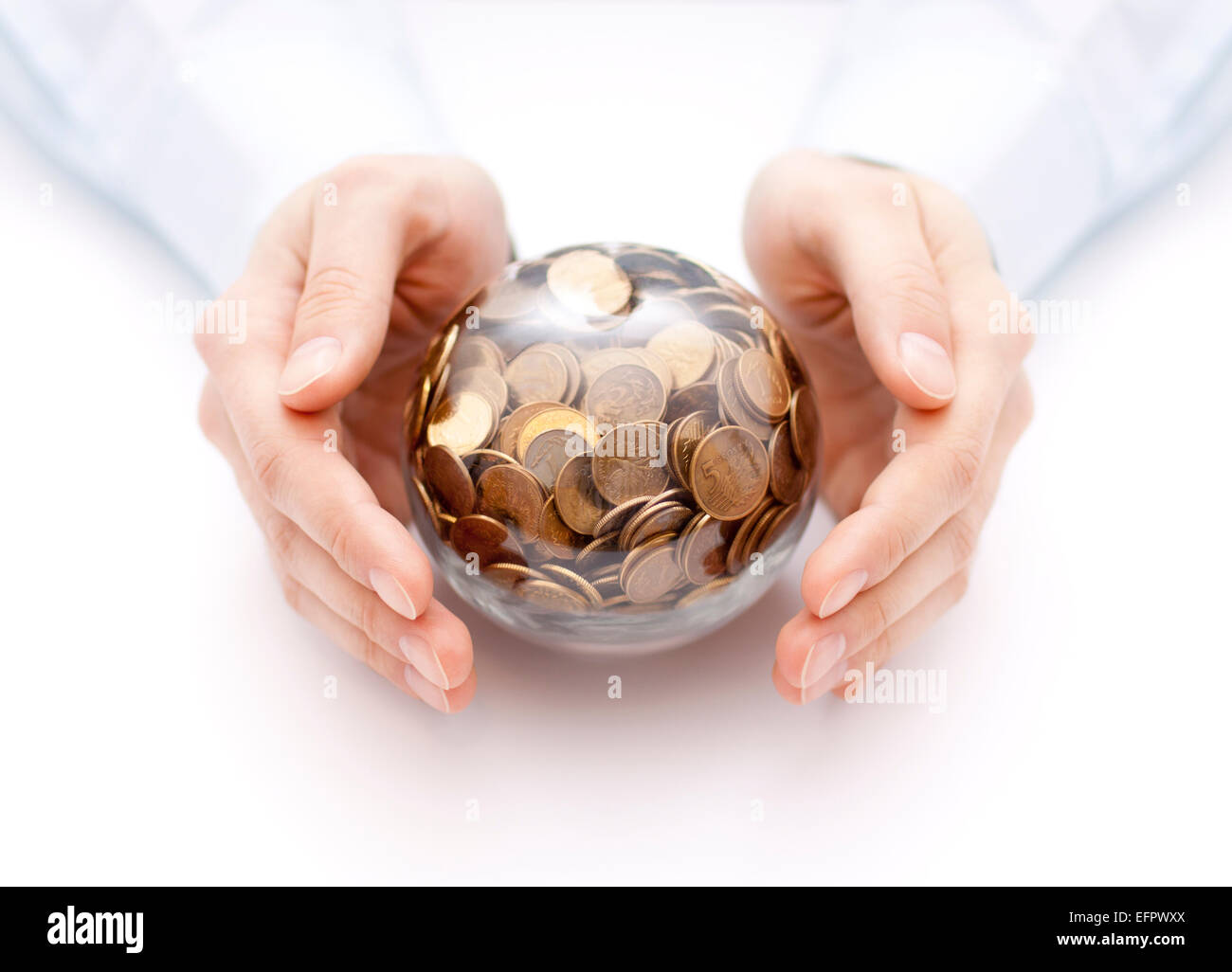 Crystal ball with money in hands Stock Photo