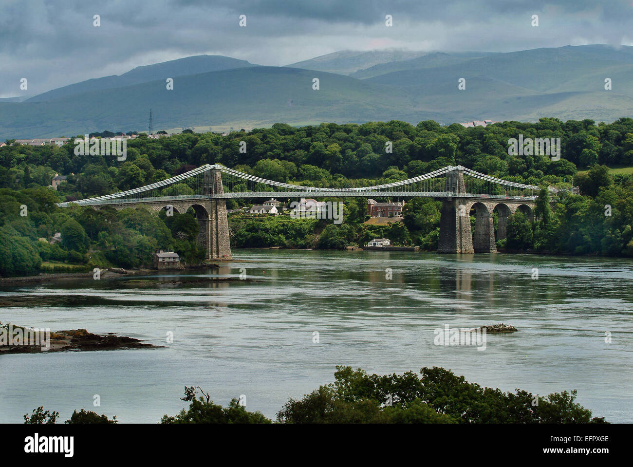 The Menai Suspension Bridge spanning the Menai Strait from Wales to