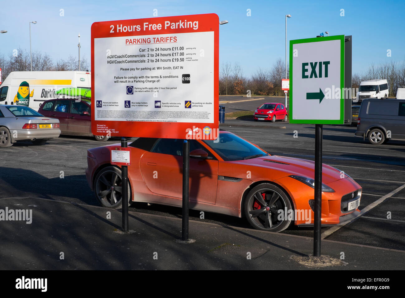 Parking sign and car park at the Welcome Break services off the M54 motorway near Telford, Shropshire, England. Stock Photo