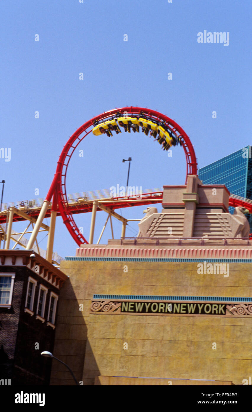 A roller coaster roars across the skyline at New York, New York Hotel