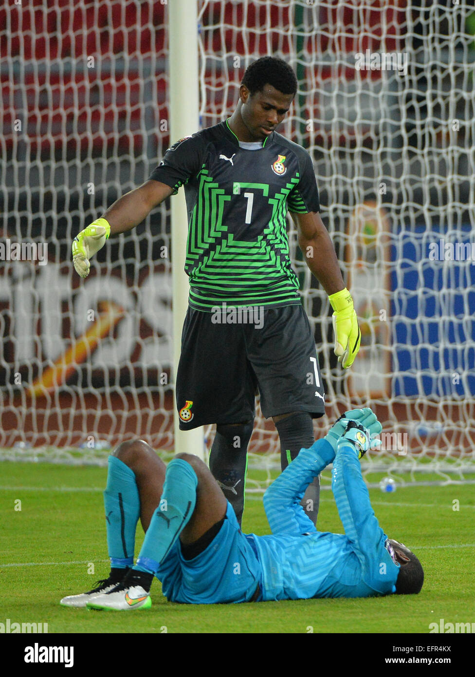 Bata, Equatorial Guinea. 08th Feb, 2015. Africa Cup of Nations Final. Razak Braimah (GHA) speak with fellow keeper Boubacar Barry (CIV) during the penalties phase The Ivory Coast team won the final against Ghana with a dramatic 9-8 penalty shootout victory. Credit:  Action Plus Sports/Alamy Live News Stock Photo