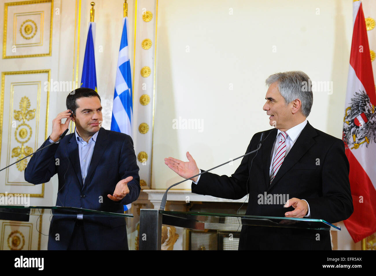 (150209) -- VIENNA, Feb. 9, 2015 (Xinhua) -- Austrian Chancellor Werner Faymann (R) and Greece's Prime Minister Alexis Tsipras attend a joint press briefing after their meeting in Vienna, capital of Austria, on Feb. 9, 2015. Greece's newly elected Prime Minister Alexis Tsipras said on Monday he was confident of striking a deal with European partners. (Xinhua/Qian Yi) Stock Photo
