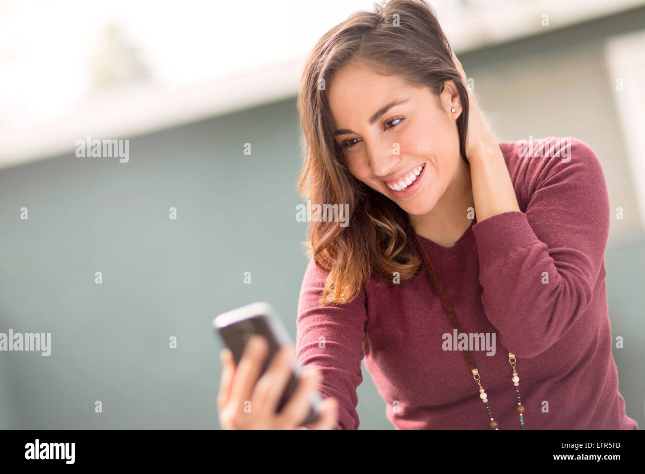 Woman using smartphone Stock Photo