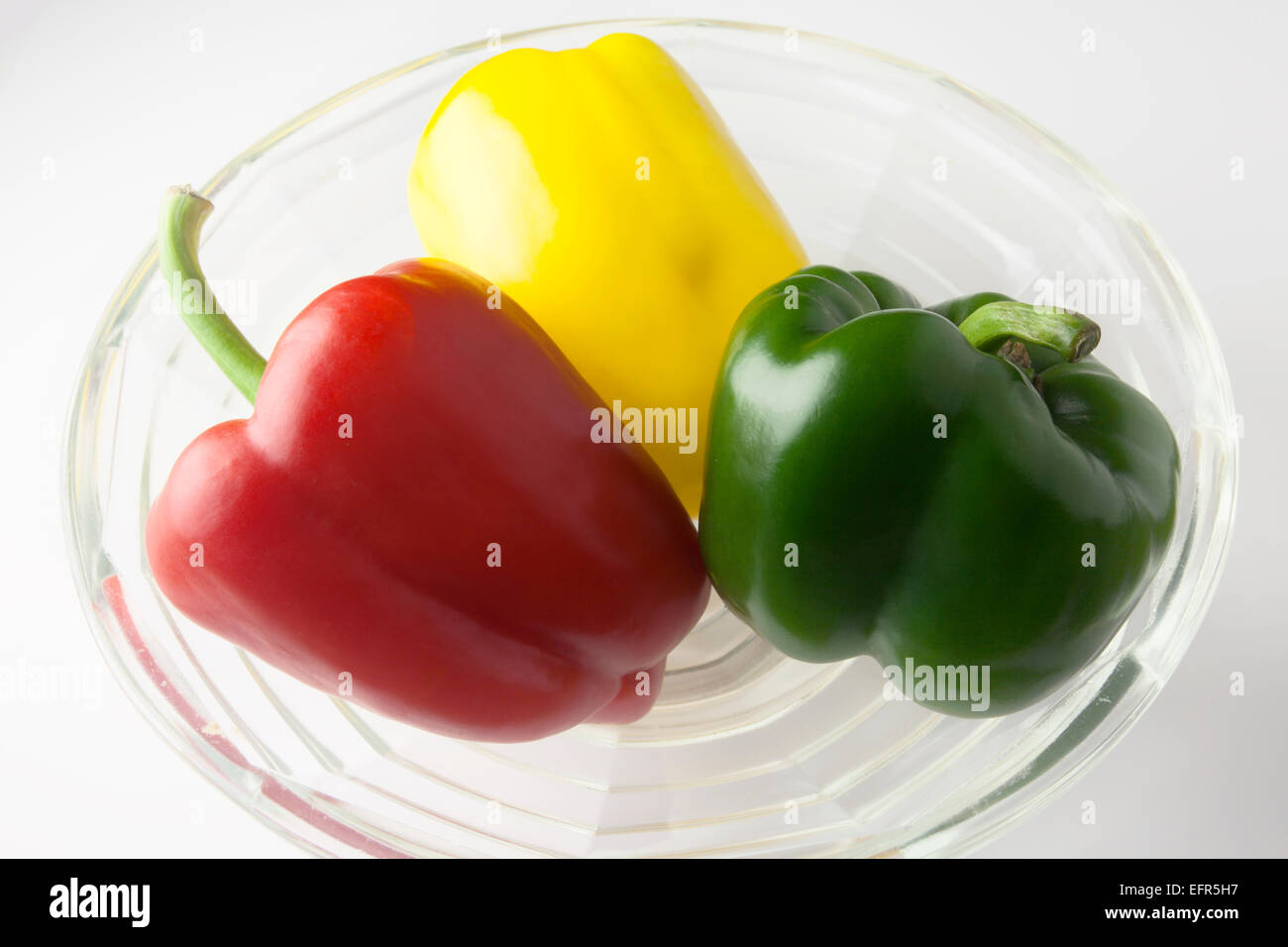 Red Yellow and Green Peppers in a Glass Bowl Stock Photo - Alamy