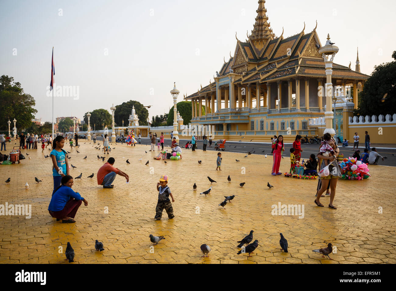 People at a square in front of the Royal Palace, Phnom Penh, Cambodia. Stock Photo