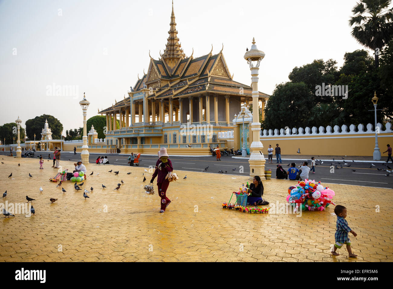 People at a square in front of the Royal Palace, Phnom Penh, Cambodia. Stock Photo
