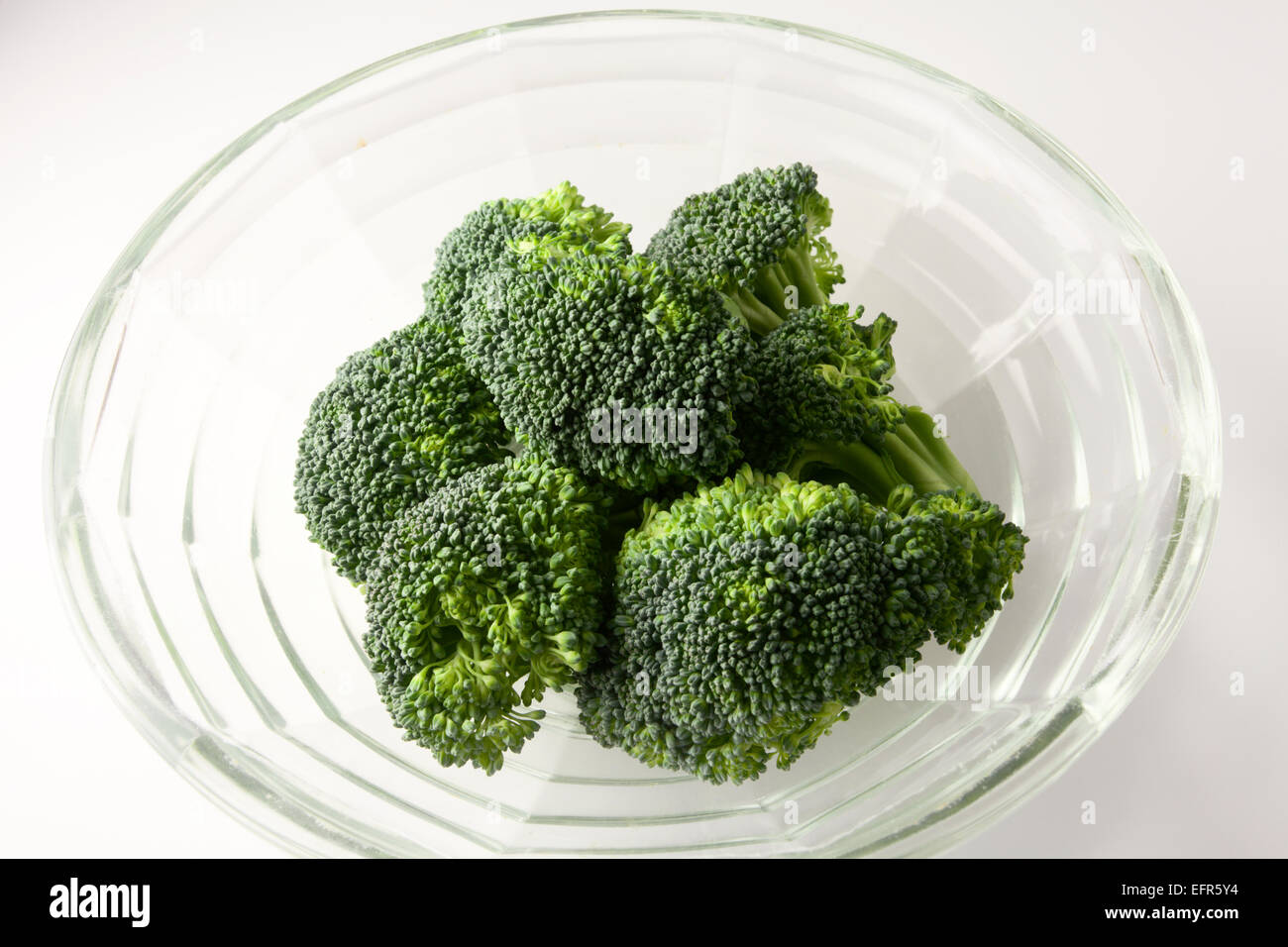 Broccoli Florets in a Glass Bowl Stock Photo