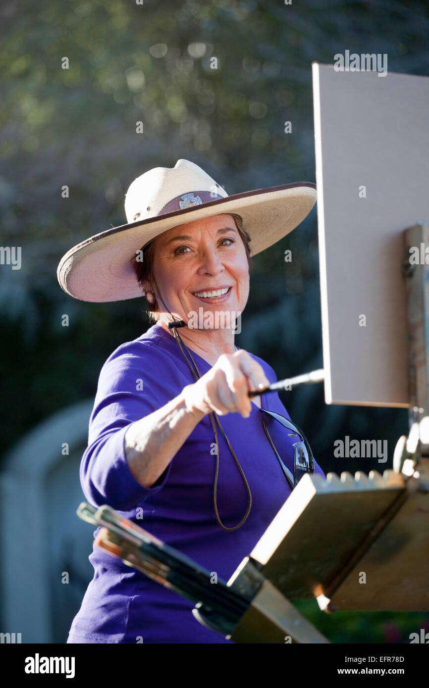 Female artist painting in Albin Polasek Museum and Sculpture Garden