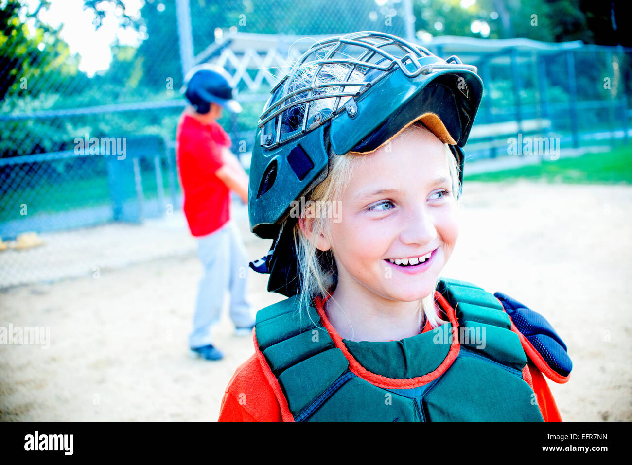 Young girl wearing baseball kit Stock Photo Alamy