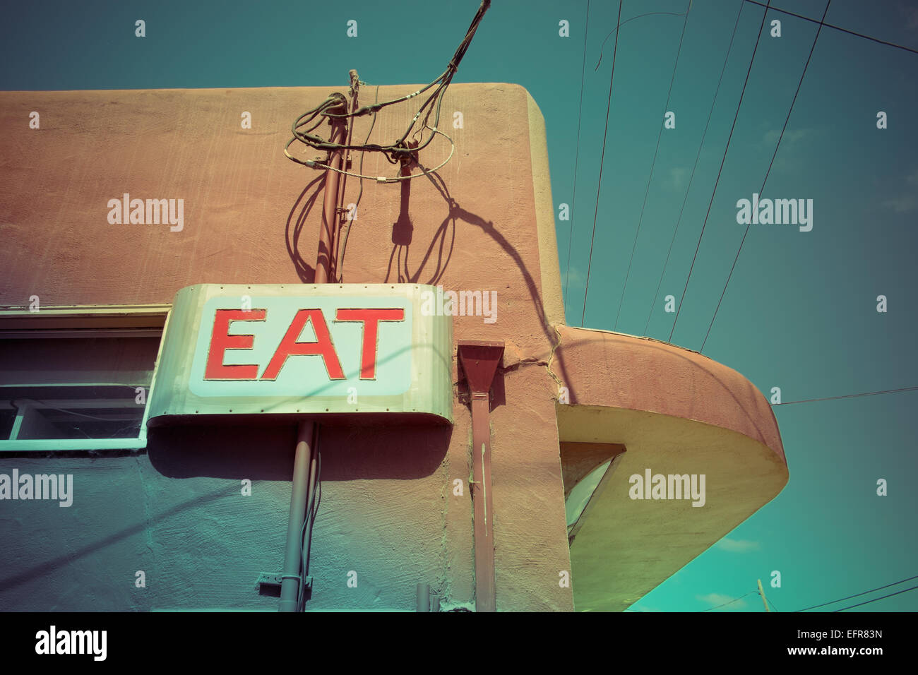 Low angle view of eat sign on cafe wall, Pescardero, California, USA Stock Photo