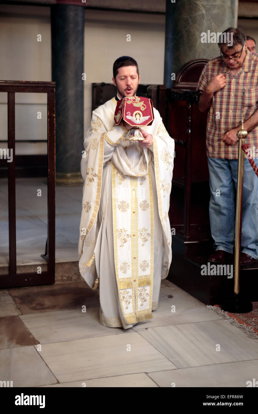 Priest on Orthodox Christian church service, Church of St. George, Istanbul, Turkey Stock Photo