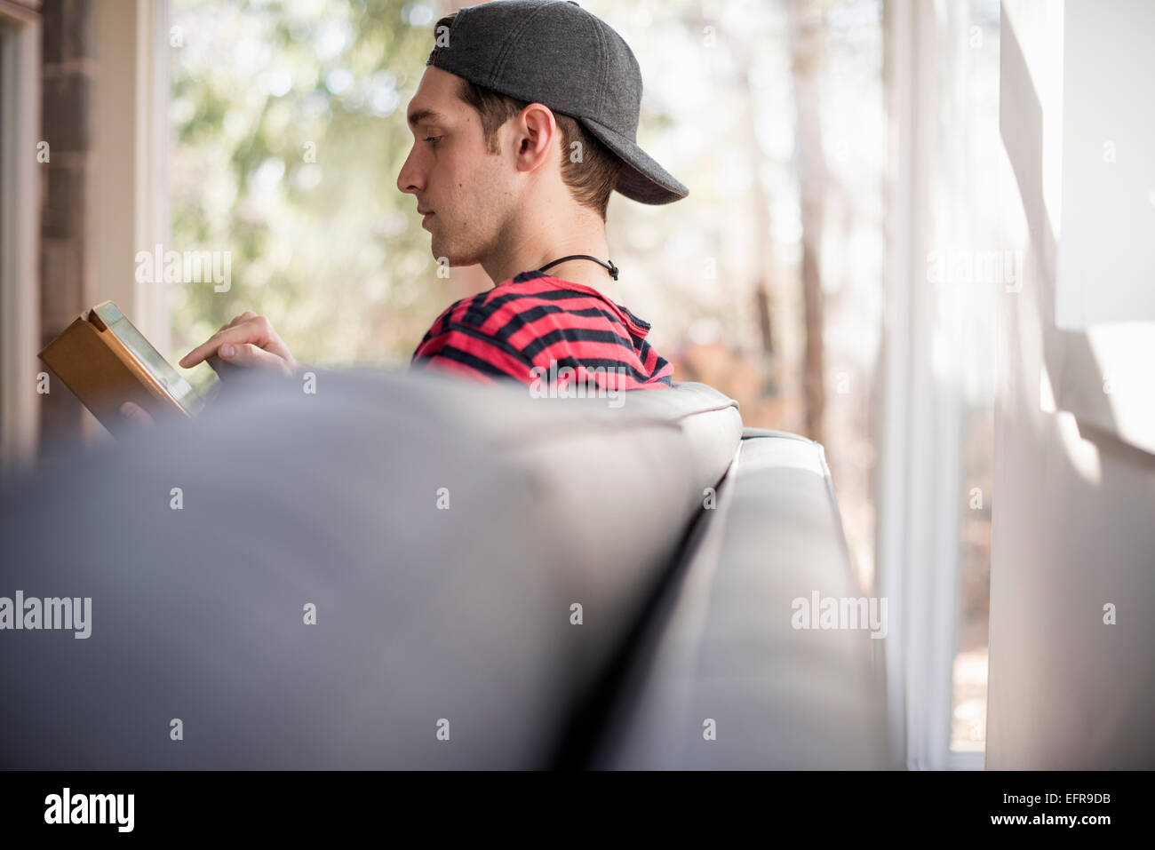 Baseball cap backwards hi-res stock photography and images - Alamy