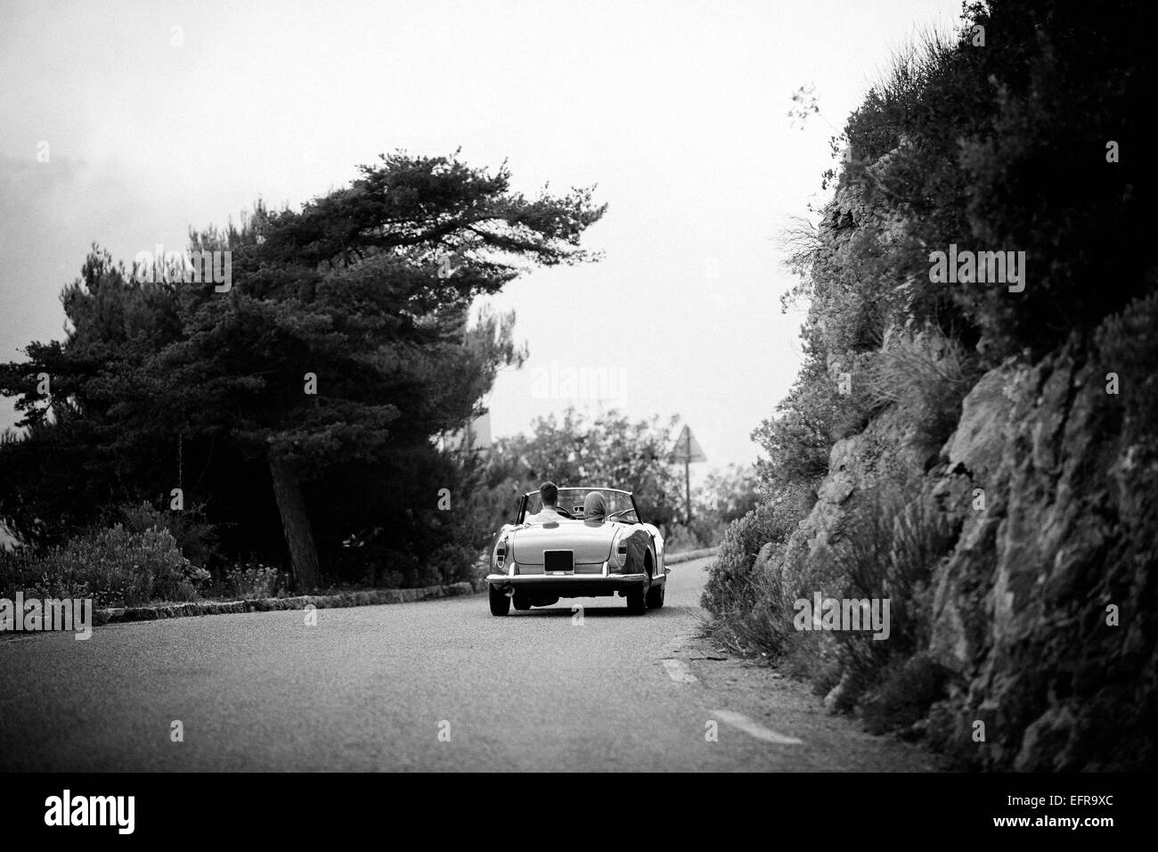 Driving a classic car in the South of France Stock Photo